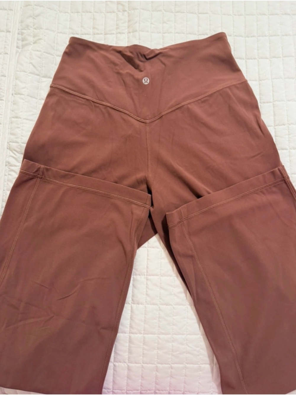 Lululemon High-Rise Wide-Leg aligns yoga pants in Dusty Rose